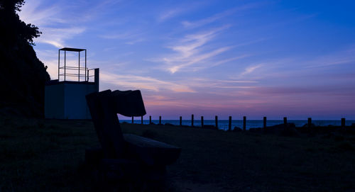 Scenic view of beach against sky during sunset