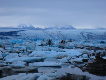 Scenic view of snow covered mountains