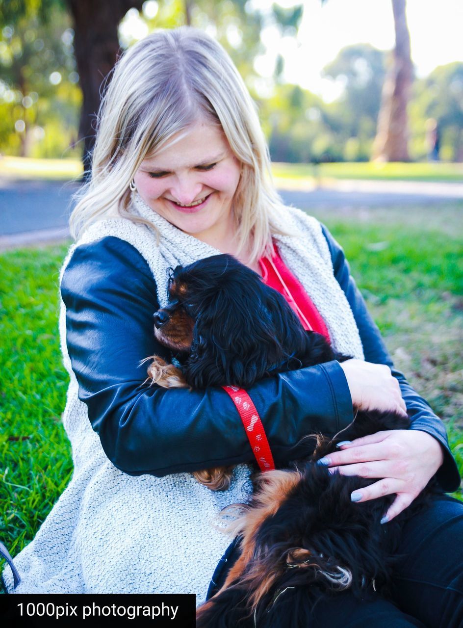 SMILING GIRL WITH DOG AND WOMAN WITH DOGS