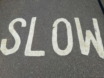 High angle view of sign on street