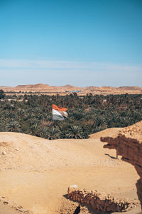 Scenic view of desert against clear sky