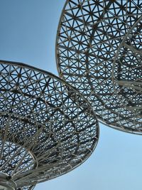 Low angle view of ferris wheel against sky