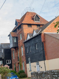 Low angle view of buildings against sky