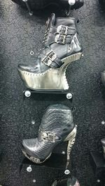 High angle view of shoes on tiled floor