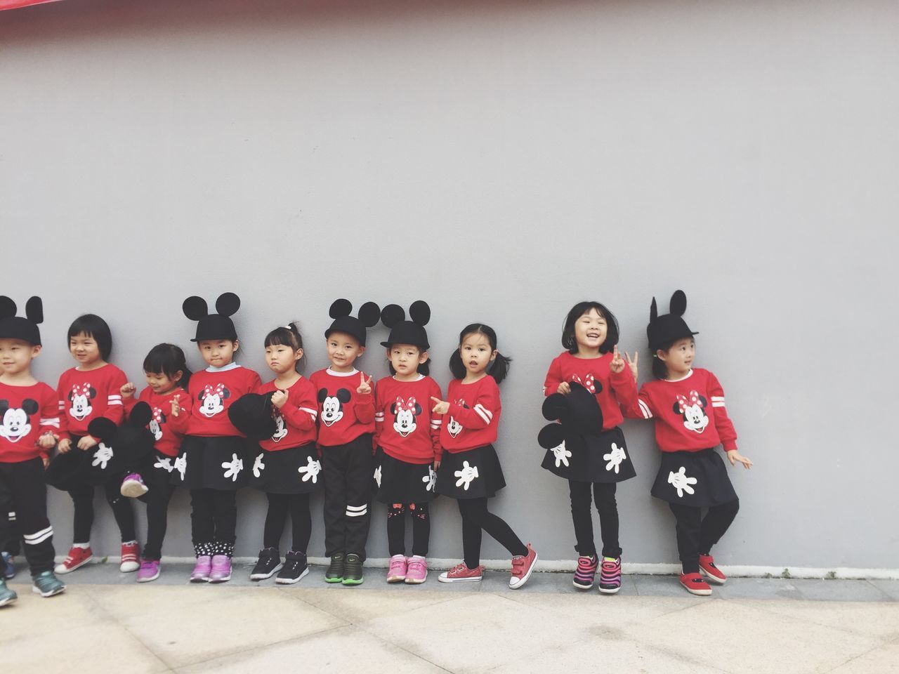 full length, uniform, child, boys, elementary age, real people, childhood, children only, indoors, cheerful, sports uniform, people, day, junior high
