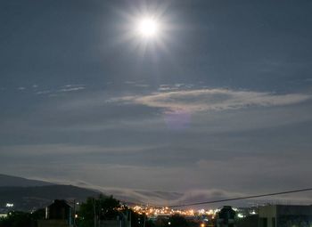 Scenic view of sun shining in sky