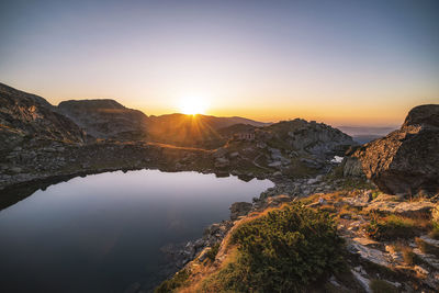 Scenic view of mountains against sky during sunset