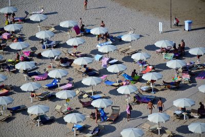 View of people relaxing on beach