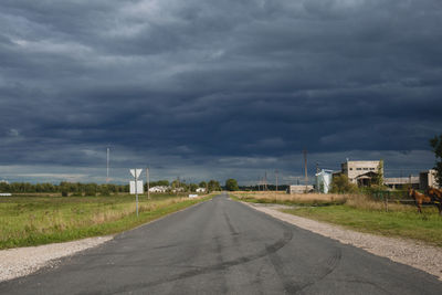 Road against cloudy sky