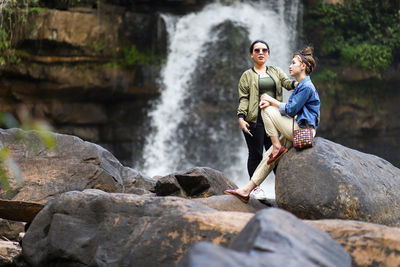 Young couple on rock