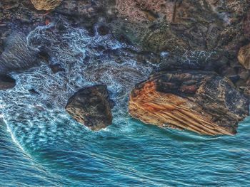 Close-up of rock in sea