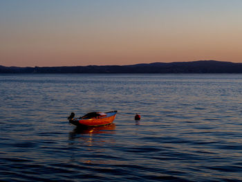 View of calm sea at sunset