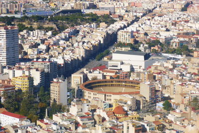 High angle shot of townscape against cityscape