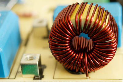 Coil electronic on printed circuit board detail. inductor with copper wire on pcb.