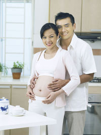 Portrait of a smiling young couple