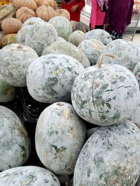 Stack of pumpkins at market