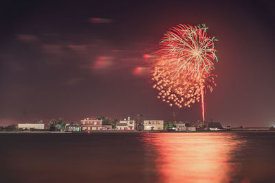 Firework display at night