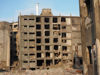 Abandoned construction site against sky