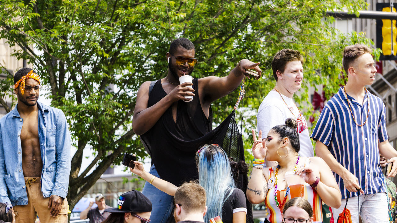 group of people, tree, real people, men, day, leisure activity, young adult, young men, women, plant, lifestyles, standing, adult, crowd, young women, nature, people, group, medium group of people, outdoors