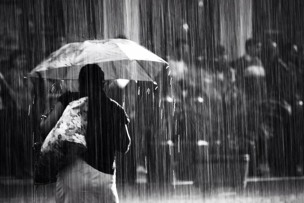 lifestyles, leisure activity, standing, person, rear view, night, reflection, holding, indoors, umbrella, casual clothing, men, side view, illuminated, motion, full length, long hair, three quarter length