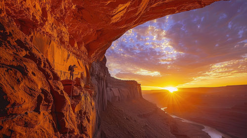 Scenic view of mountains against sky during sunset