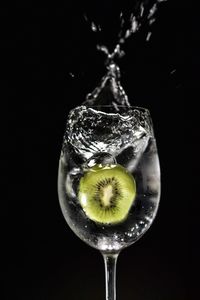 Close-up of fruit over black background