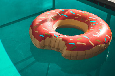 Inflatable doughnut in swimming pool