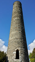 Low angle view of built structure against blue sky