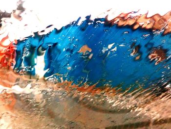 Close-up of water drops on window