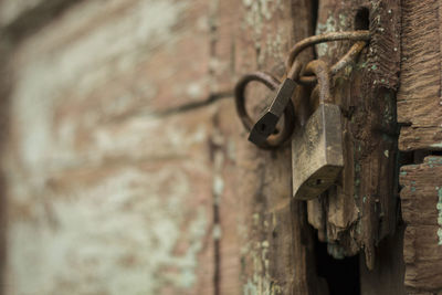 Close-up of padlock on wall