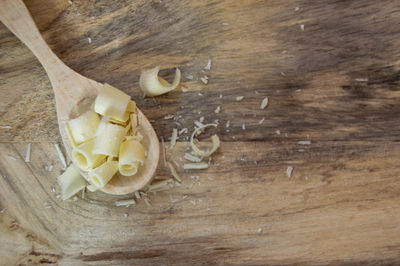 High angle view of chopped bread on cutting board