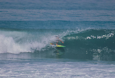 Man surfing in sea