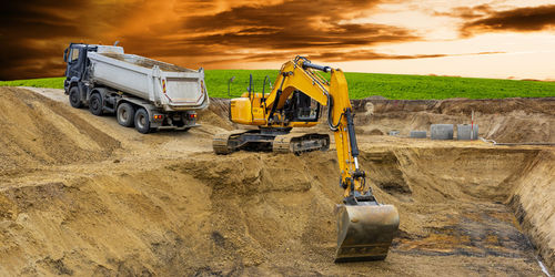 Heavy excavator working at construction site