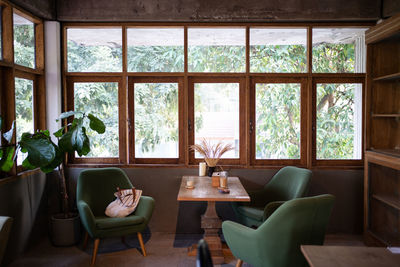 Retro cafe with wooden furniture and wood ceiling