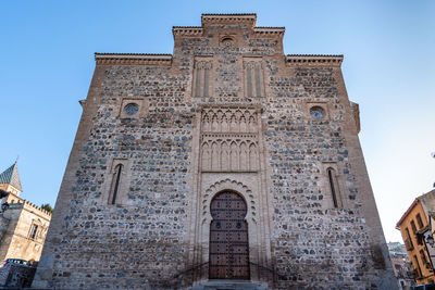 Low angle view of historical building against sky