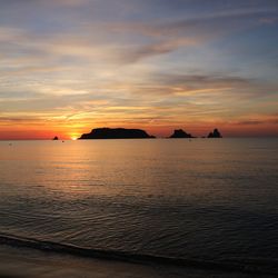 Scenic view of sea against sky during sunset