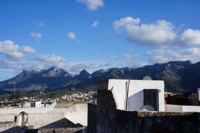 Buildings in tetuan town against cloudy sky