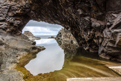 Natural pools of ocean water with sheer cliffs at seixal madeira portugal