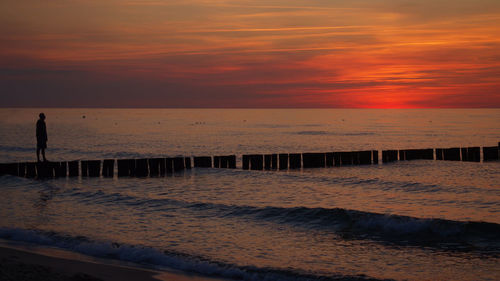 Scenic view of sea at sunset