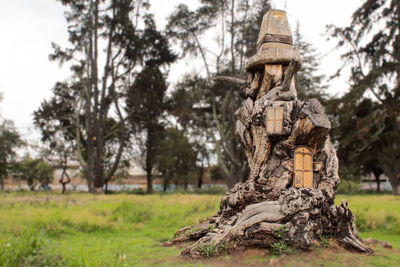 Sculpture of tree on field