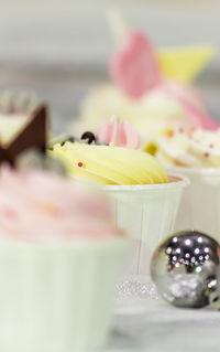 Close-up of cupcakes on table