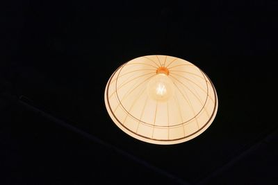 Low angle view of illuminated pendant light