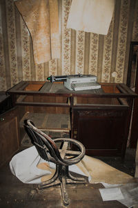 Empty chairs on table at home