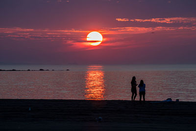 Warm summer sunrise over the ocean in new hampshire.