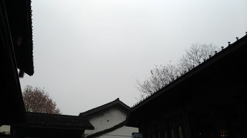 Low angle view of house against clear sky