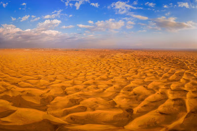 Scenic view of desert against sky