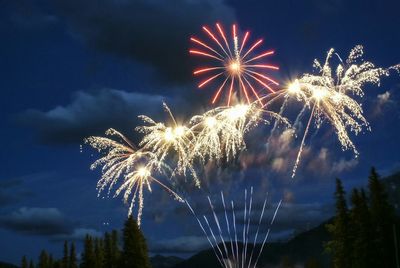 Low angle view of sky illumed with fire crackers