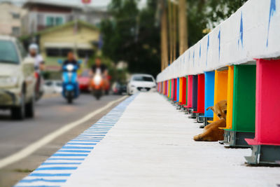 Row of car on street in city