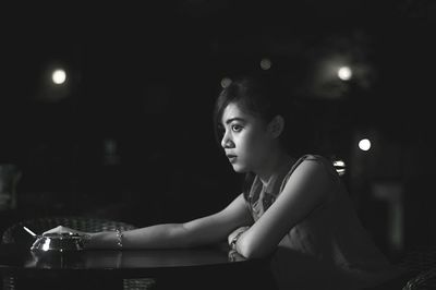 Young woman waiting in restaurant