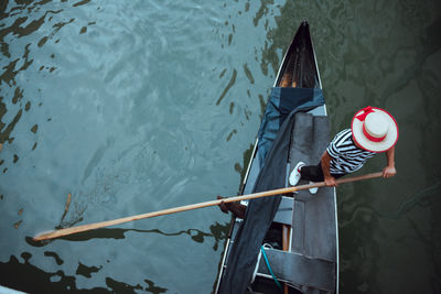 Low angle view of flag on water